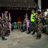 Kerjasama TNI Bersama Banser, TNI dan Banser berpatroli bersama untuk menjaga keamanan masyarakat.