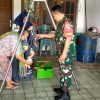 Wujudkan Balita Sehat, Babinsa Koramil 0810/03 Loceret Dampingi Kegiatan Posyandu di Desa Nglaban
