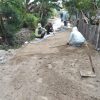 Babinsa Gondang dan Warga Gotong Royong Pasang Paving Jalan Desa