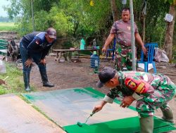 Babinsa Mulai Pengecatan Papan Jembatan Garuda