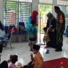 Wujud Nyata Babinsa Koramil 08 /Baron mendampingi program posyandu Kesehatan Masyarakat.
