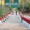 Jaga Akses Vital Warga, Babinsa Sawahan Bersama Linmas Patroli Jembatan Merah Putih Desa Bareng