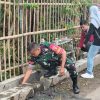 Cegah Banjir Sejak Dini, Babinsa dan Warga Cangkringan Bersihkan Saluran Got