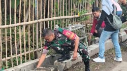 Cegah Banjir Sejak Dini, Babinsa dan Warga Cangkringan Bersihkan Saluran Got